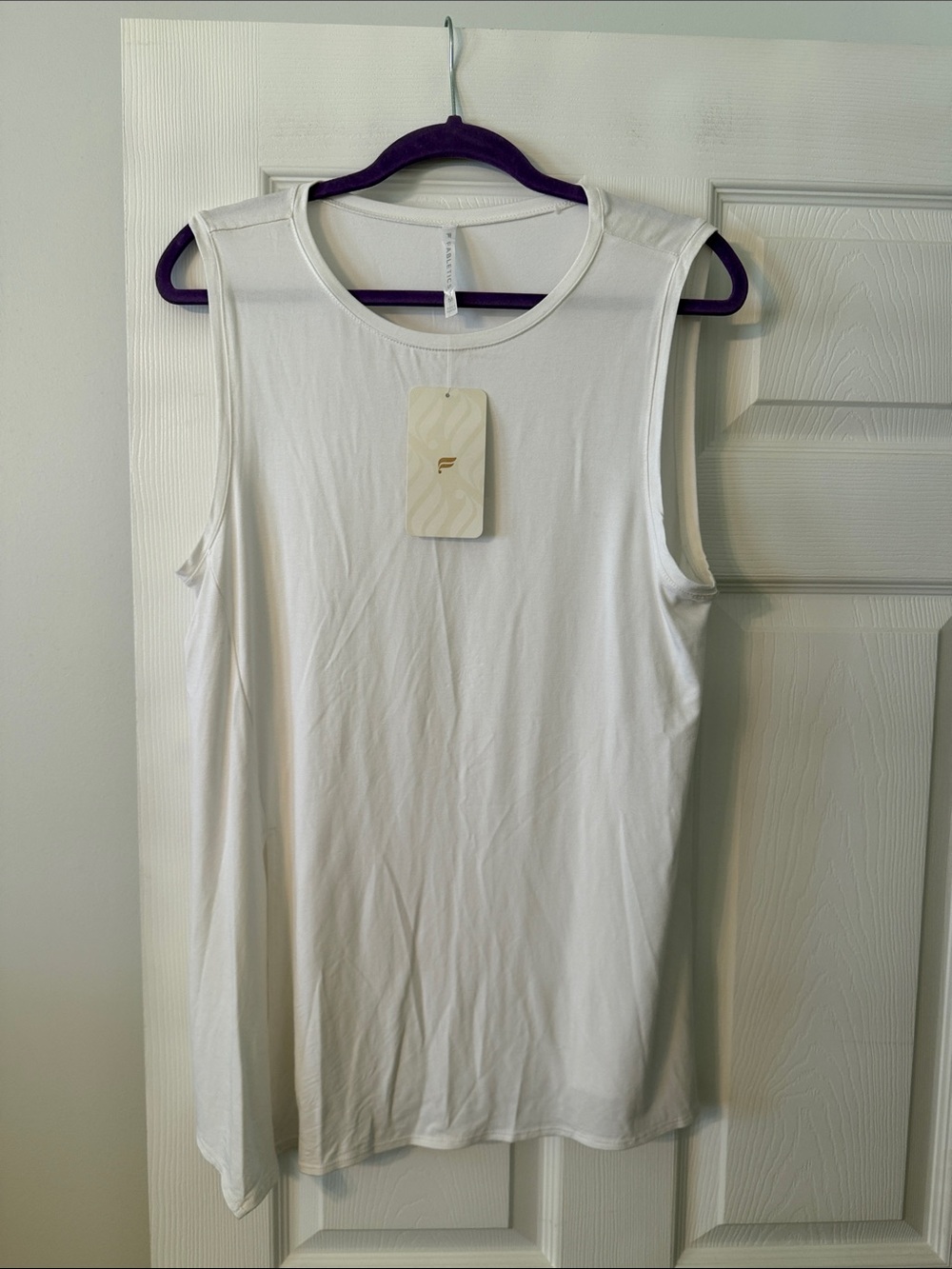 Fabletics White Sleeveless  Tank  size M brand new length 28” bust 38”